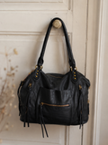 Sac cabas femme Matera noir 38 × 32 × 13 cm en cuir synthétique souple avec bandoulière amovible et multiples poches.